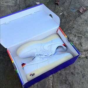 Nike White Athletic Shoes with Rainbow Accents